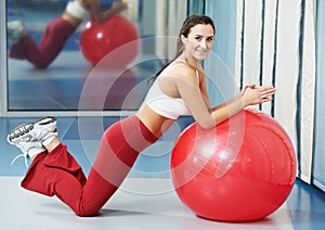 Happy healthy woman with fitness ball