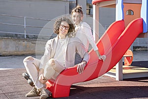 Happy heterosexual couple at the playground