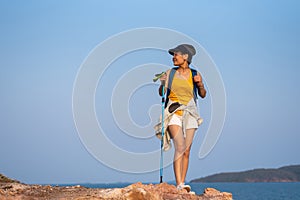 Happy hiker reaching the top