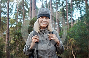 Happy, hiking and portrait of old woman in nature for relax, trekking and adventure. Travel, wellness and vacation with