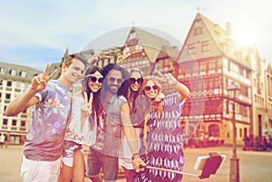 Happy hippie friends taking selfie in frankfurt