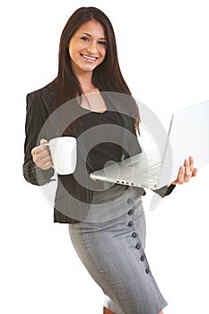 Happy hispanic business female on laptop