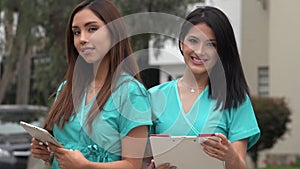 Happy hispanic female nurses