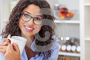 Happy Hispanic Woman Smiling Drinking Tea or Coffee