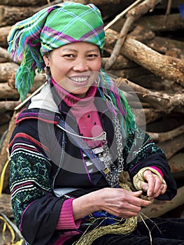 Happy Hmong Woman Dressed in Traditional Attire in Sapa, Vietnam