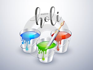 Happy Holi celebration concept with realistic buckets full of water colours and color gun.