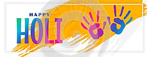 Happy holi festival celebration banner with hand prints