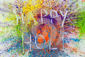 Happy Holi text on colorful background photo