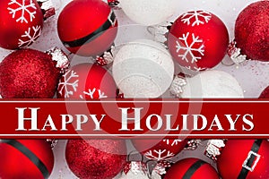 Happy Holiday greetings with red and white Christmas ball ornaments