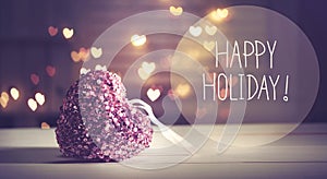 Happy Holiday message with a pink heart