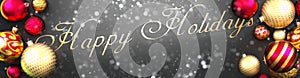 Happy holidays and Christmas,fancy black background card with Christmas ornament balls, snow and an elegant word Happy holidays,