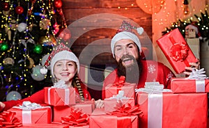 Happy holidays. Favorite childhood memories of christmas. Father bearded man and daughter near christmas tree. Spend