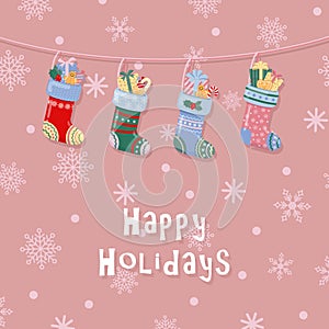 Happy Holidays greeting background. Socks and gifts. Merry Christmas card