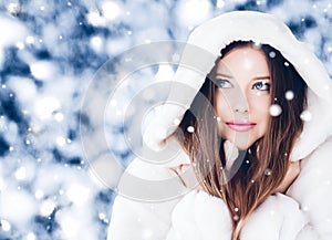 Happy holidays, lifestyle and winter fashion, beautiful woman wearing white fluffy fur coat, snowing snow in snowy