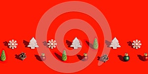 Happy holidays, Merry Christmas, New Year concept. Bright pattern with different natural wooden toys, pine cone