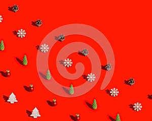 Happy holidays, Merry Christmas, New Year concept. Bright pattern with different natural wooden toys, pine cone