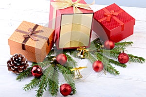 Happy Holidays. New Year or Christmas decorations with gift boxes, candles and balls. greeting card