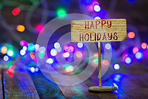 Happy holidays on small sign board