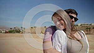 happy honeymoon near sea, newlyweds are travelling on seashore