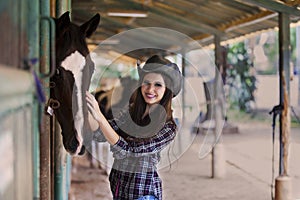 Happy horse rider at ranch