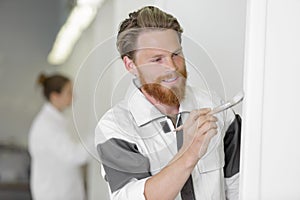 happy house painter at work