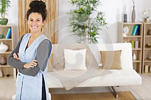 happy housekeeper looking at camera
