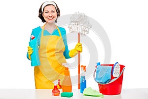 Happy housewife cooked cleaners for cleaning the house