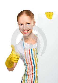 Happy housewife with thumbs up with white empty billboard isola