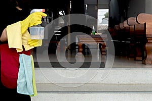 Happy housewives in rubber gloves with dust-wiping equipment, aerosol cleaners ready cleaning. concept do housework