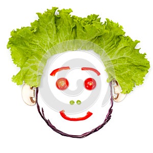Happy human head made of vegetables