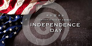 Happy Independence day: 4th of July, American flag on dark stone background with the text