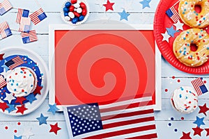 Happy Independence Day 4th july mockup with american flag and sweet foods, decorated with stars and confetti. Top view.