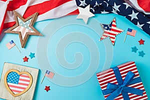 Happy Independence Day, 4th of July patriotic frame border background with gift box, stars and USA flag. Top view, flat lay