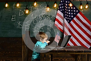 Happy independence day of the usa. E-learning or online courses at home schooling. Patriotism and freedom. Little boy