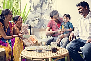 A happy Indian family spending time together at home