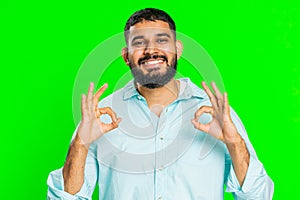Happy Indian man showing ok gesture, like sign positive feedback , celebrate victory, approve idea