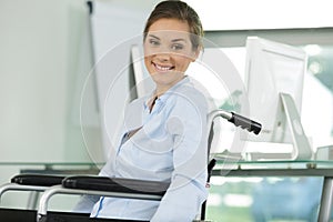 happy invalid or disabled businesswoman