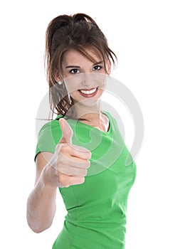 Happy isolated young woman wearing green shirt making thumb up g