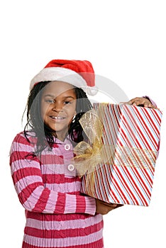 Happy jamaican child with christmas present