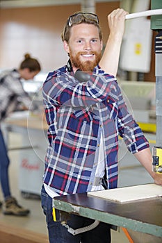 happy joiner working milling machine