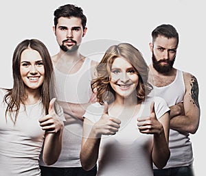 Happy joyful group of friends cheering isolated on white background.