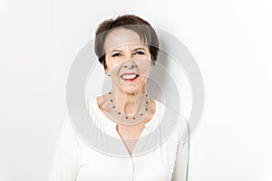 Happy joyful senior lady isolated on white background