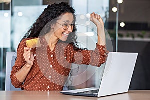 Happy joyful woman bought bargain online product with discount, business woman celebrating successful online shopping at