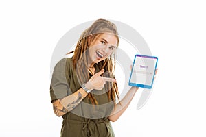 Happy joyful woman pointing at the tablet screen