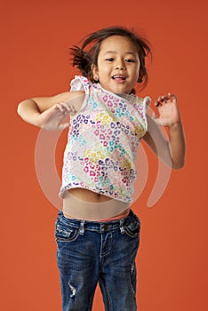 Happy jumping asian girl