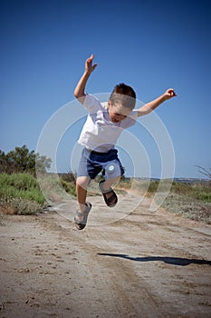 Happy jumping child