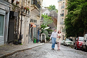 Happy just married couple walking on Montmarte