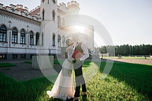 Happy just married young couple celebrating and have fun outdoors