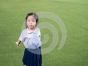 Happy kid, asian baby child playing on playground