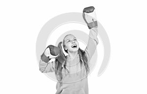 happy kid boxer in boxing gloves celebrating victory in fight isolated on white, champion